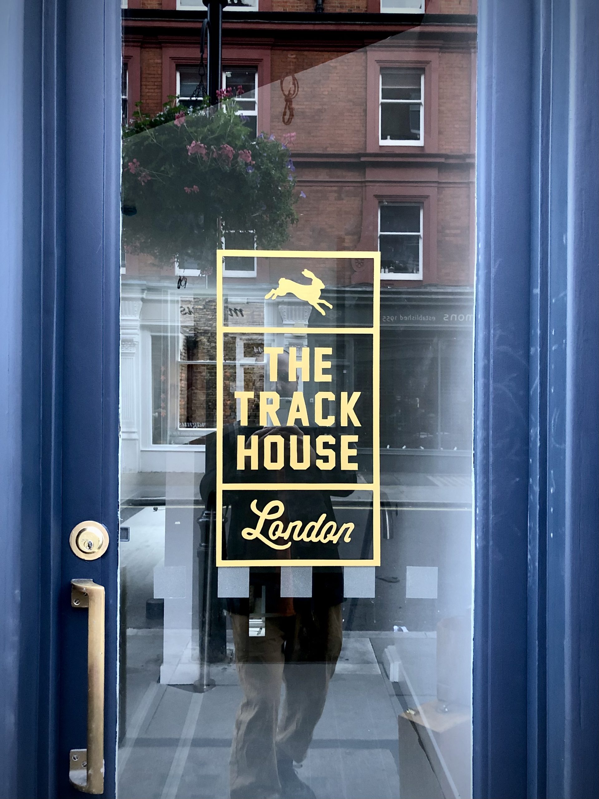 Gold lettering on glass. 23ct gold leaf gilding.